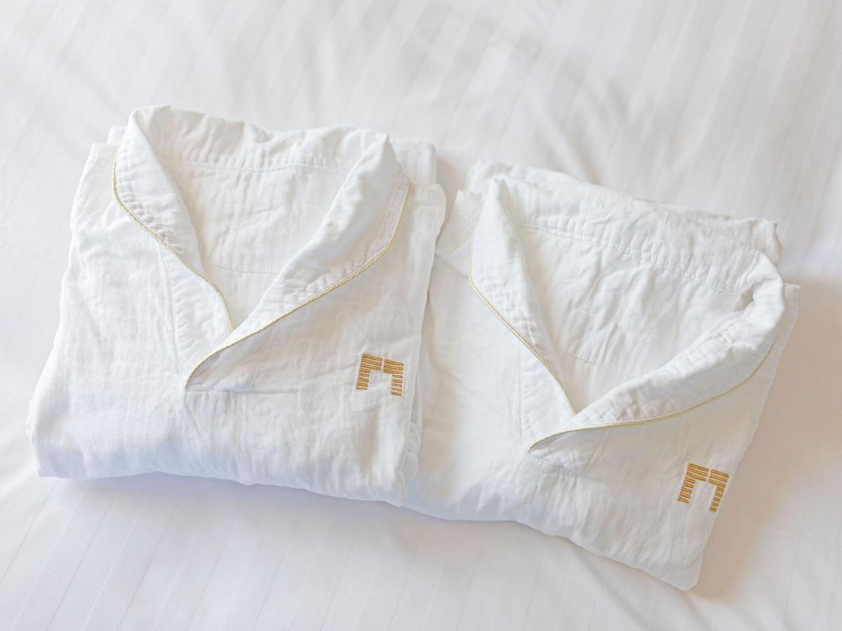 เดอะ เกท โฮเต็ล โตเกียว บาย ฮูลิค Hotel ภายนอก รูปภาพ A folded linen shirt