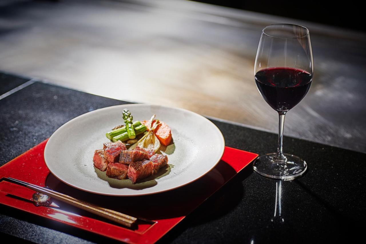เดอะ เกท โฮเต็ล โตเกียว บาย ฮูลิค Hotel ภายนอก รูปภาพ A wine glass